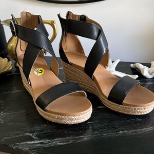 Ugg sandals. Leather upper. Weaved wedge. Excellent condition.